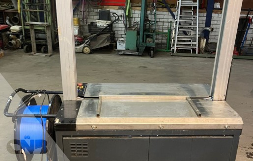 Foto van Omsnoeringsmachine