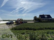 Foto van Oogstband met Tractor en afstandbediening
